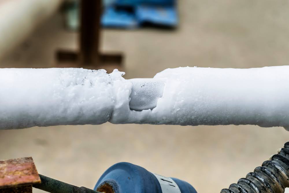 A frozen pipe of the outside AC condenser unit.